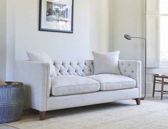 White studded outlet sofa